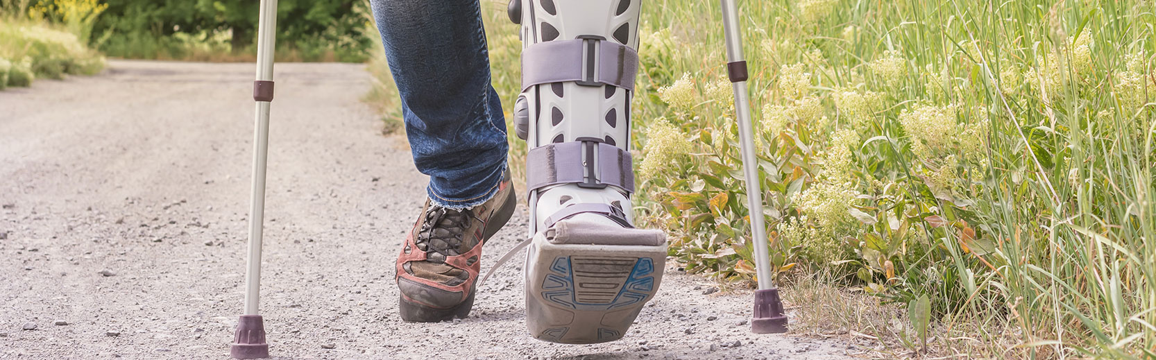 hiker shown with walking cast after having a slip and fall injury