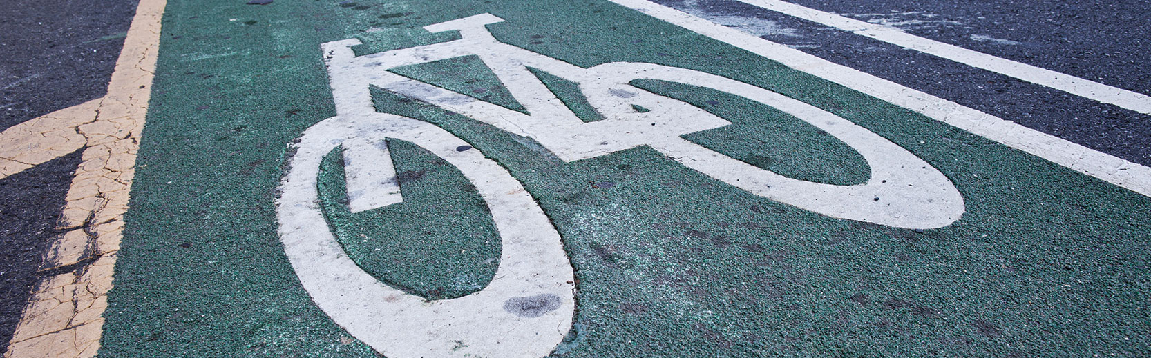 image of bicycle lane with the painted sign for bicycle